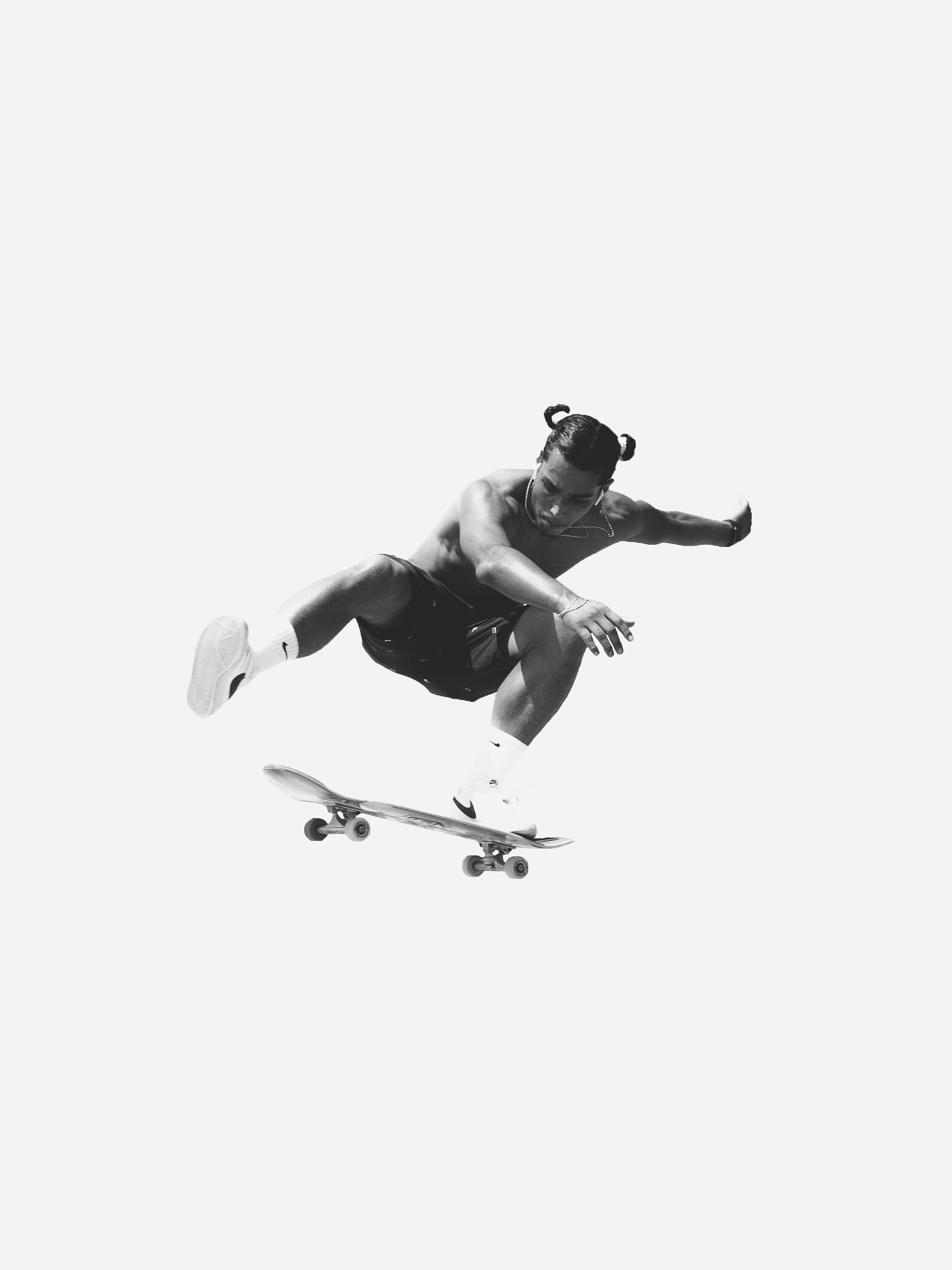 Skater doing a kickflip in the air